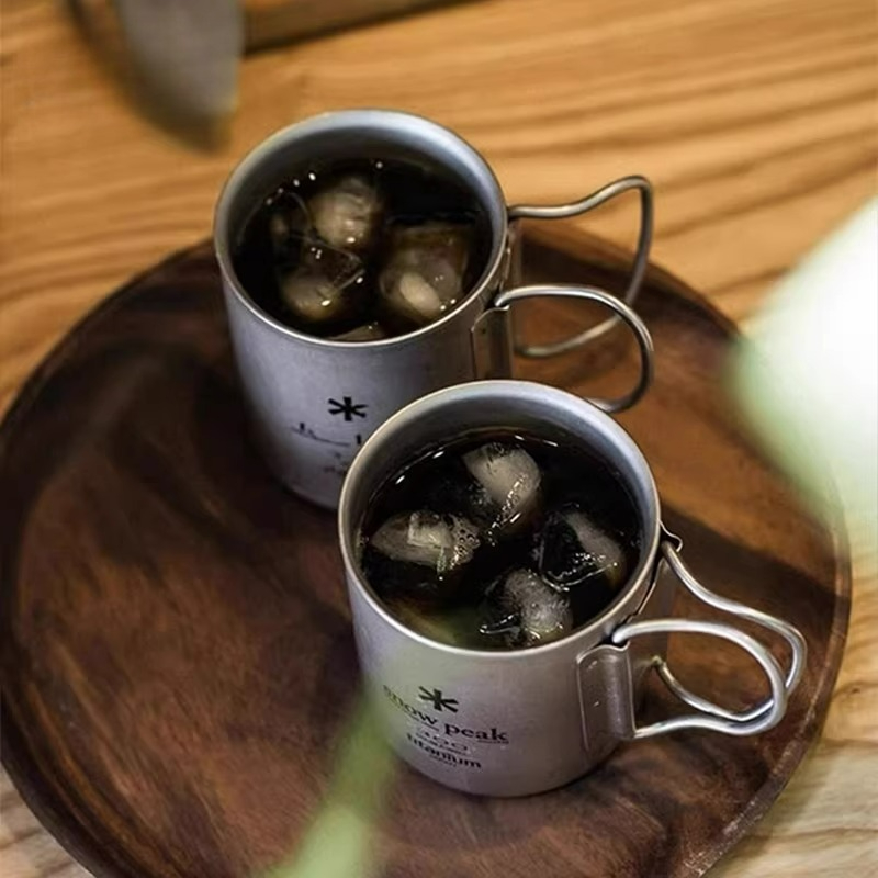كوب تيتانيوم قابل للطي من سنو  - مراجعة Camping Cooking Mug وسعره